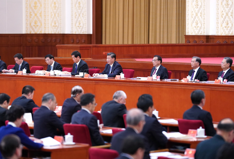 中國共產(chǎn)黨第十九屆中央委員會第五次全體會議，于2020年10月26日至29日在北京舉行。這是習近平、李克強、栗戰(zhàn)書、汪洋、王滬寧、趙樂際、韓正等在主席臺上。新華社記者 殷博古 攝